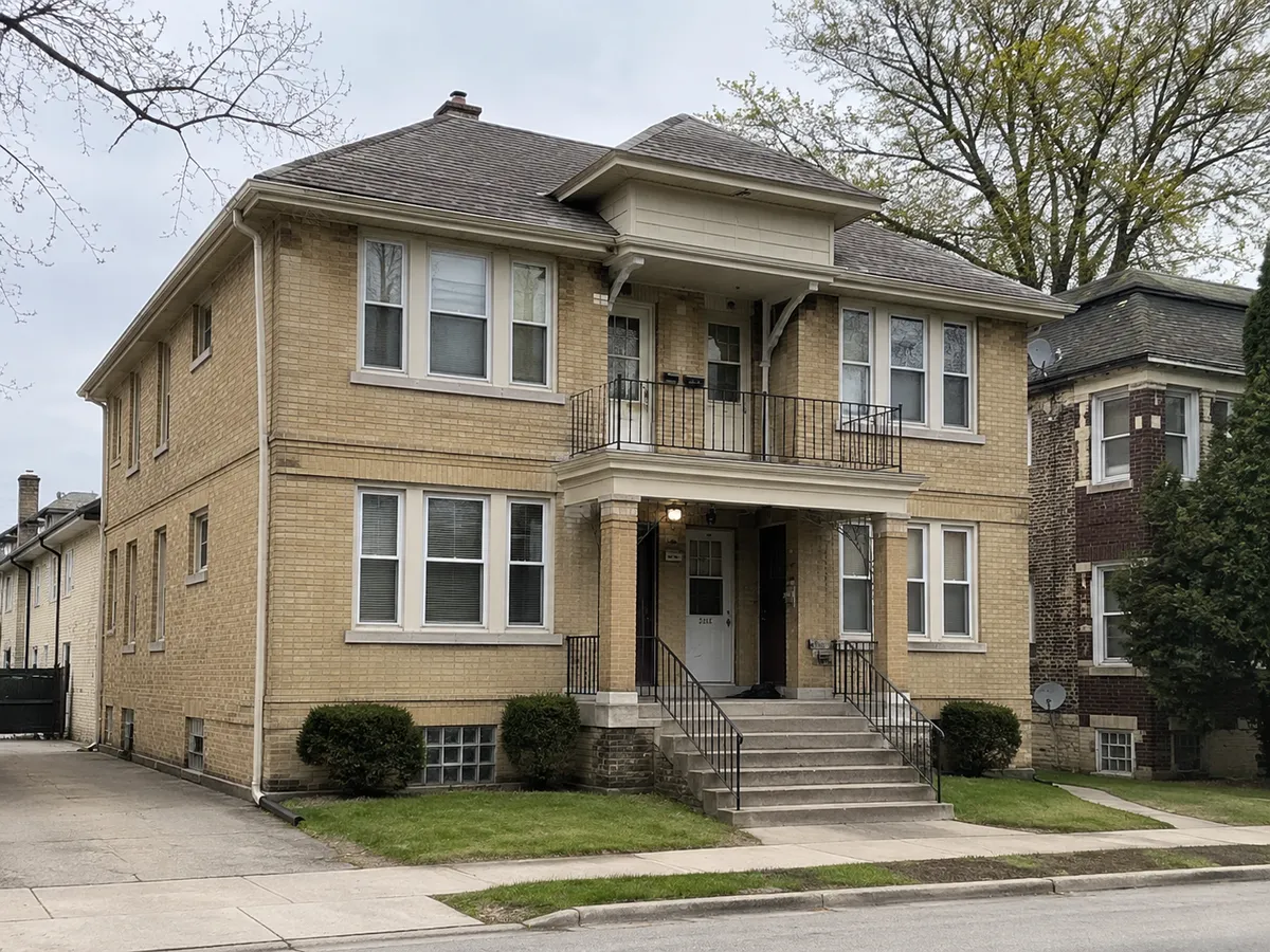 A cream city brick two-flat home in Milwaukee, WI