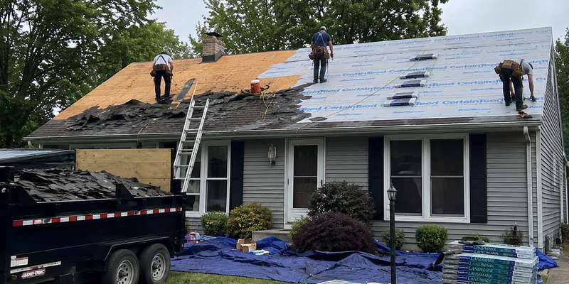 A full roof tear-off and replacement in progress on a Milwaukee-area home